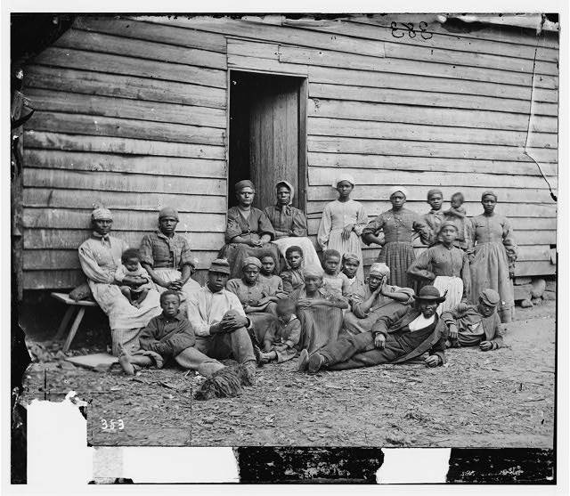 A photograph of formerly enslaved African Americans gathered at Cumberland Landing, Virginia, in 1862