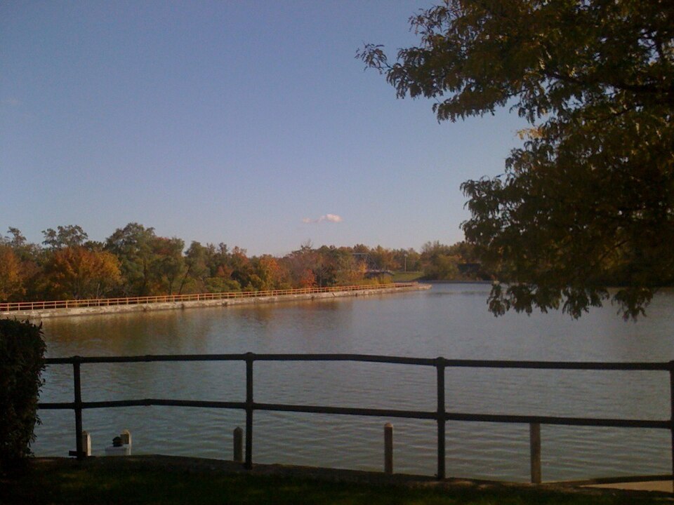 The Erie Canal with boats and buildings along the shore