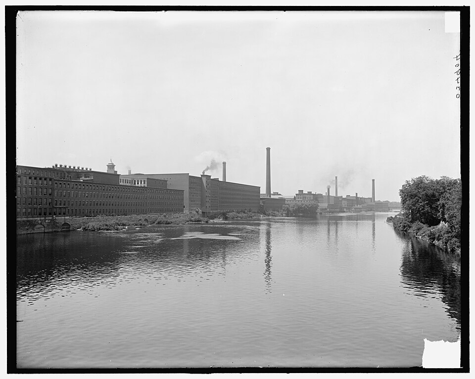 A plan of the textile mill complex at Lowell, Massachusetts, showing rows of factory buildings along the Merrimack River